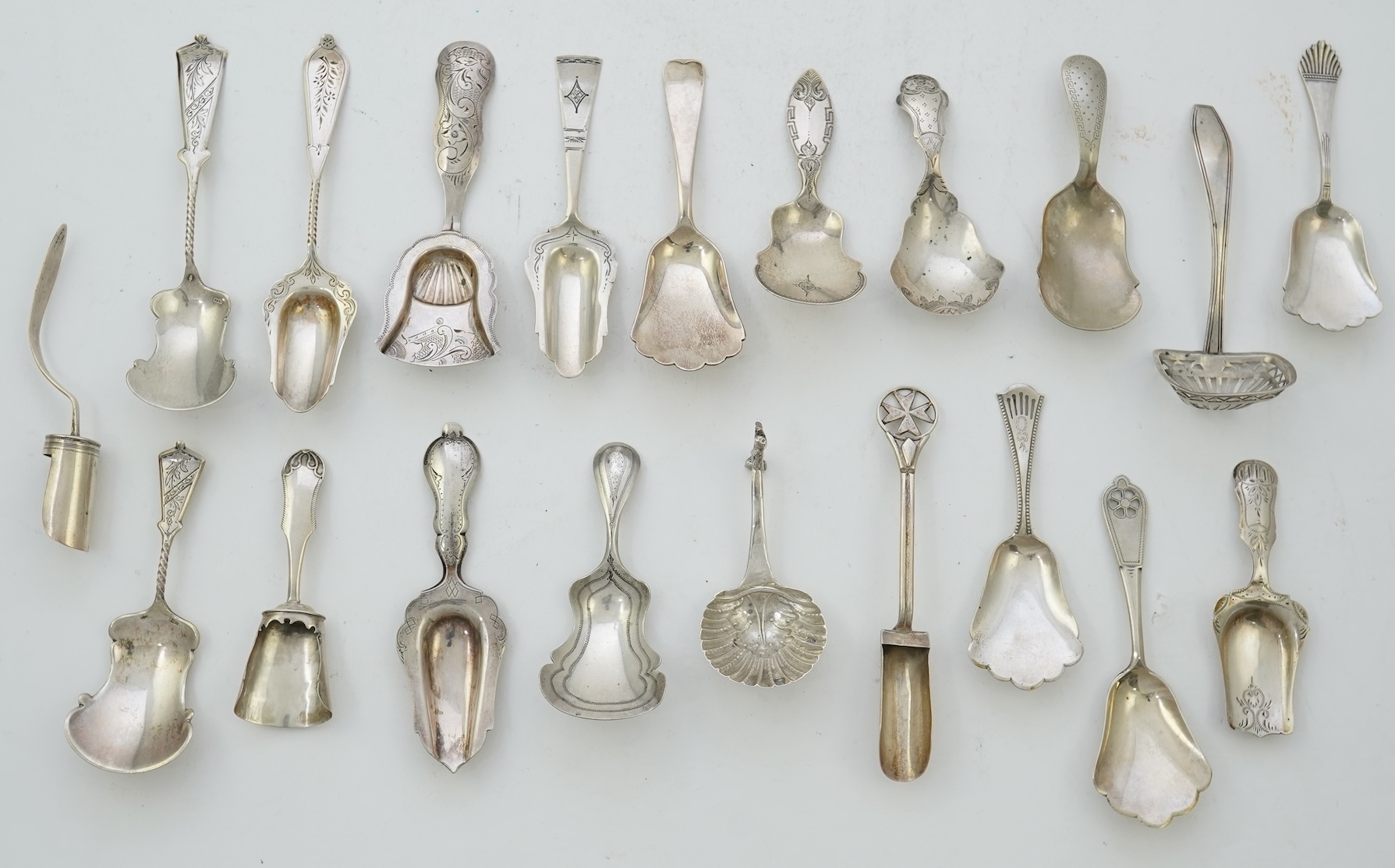 A collection of seventeen mainly 19th century Dutch white metal caddy spoons